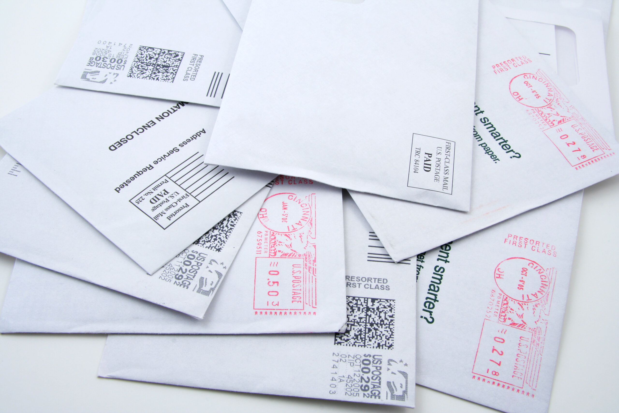 Multiple pre-sorted first-class US mail envelopes